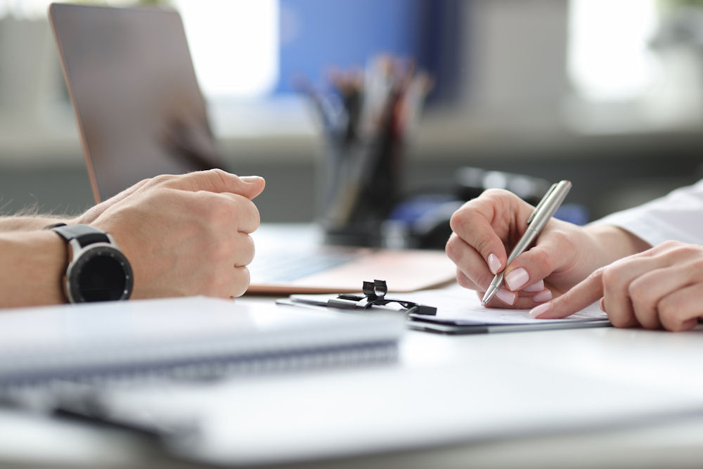 Therapist assessing woman for rehab admission